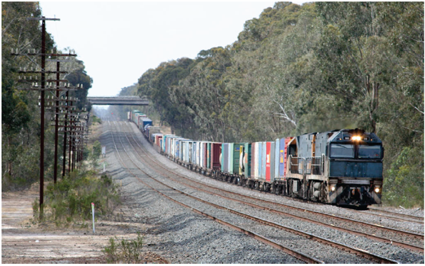 Photo shows a freight train. Photo courtesy of Marcus Wong/Wikimedia Commons