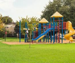 Children's playground in open park. Photo by Trong Nguyen/shutterstock.com