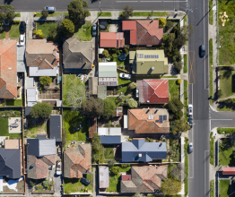 Aerial photo of a block of houses in a Melbourne suburb on a sunny day.