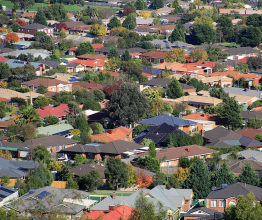 Rooftops and trees in a Victorian suburb.