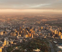 Aerial photo of Melbourne and Port Phillip bay at sunrise.